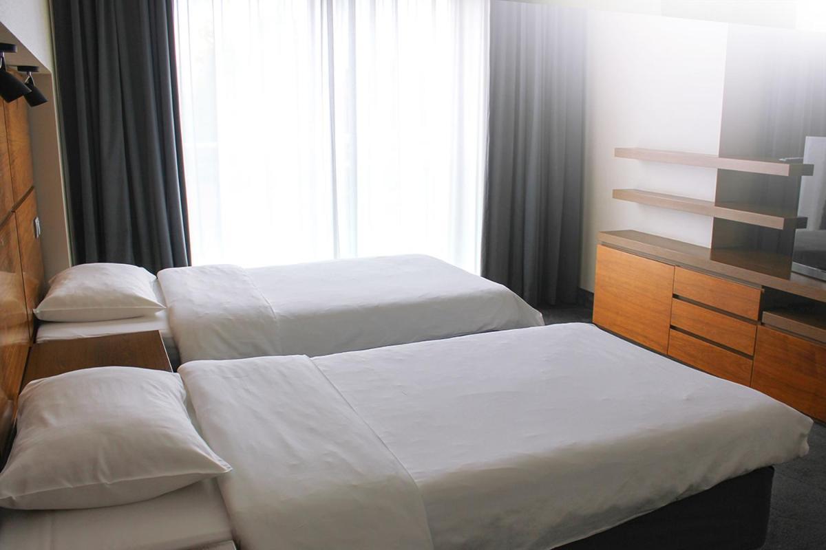 Willa Port Ostroda Bagian luar foto A bedroom at the hotel