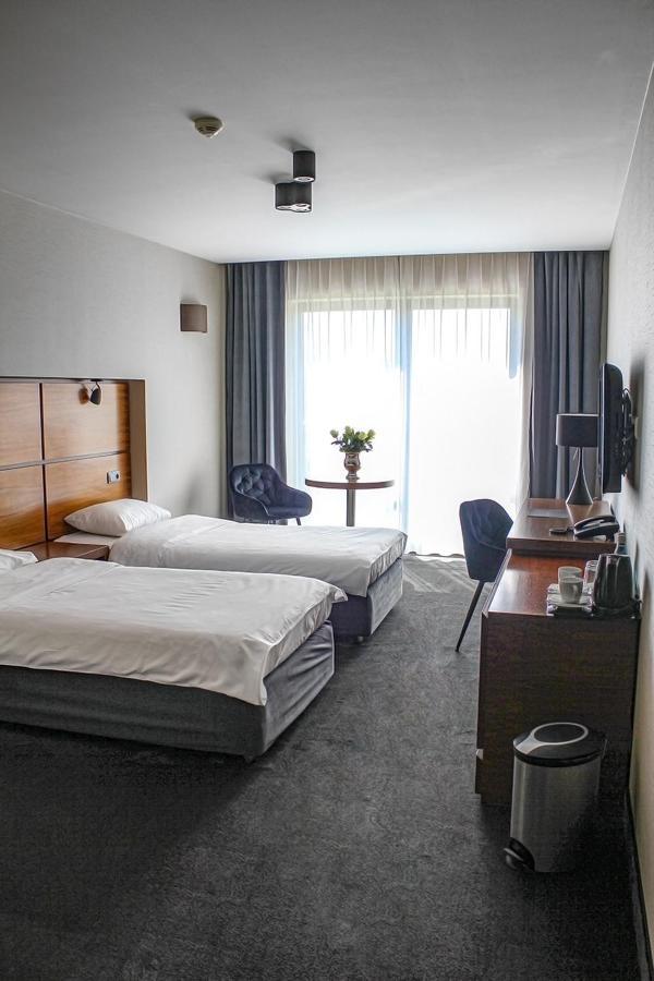 Willa Port Ostroda Bagian luar foto A room at the hotel