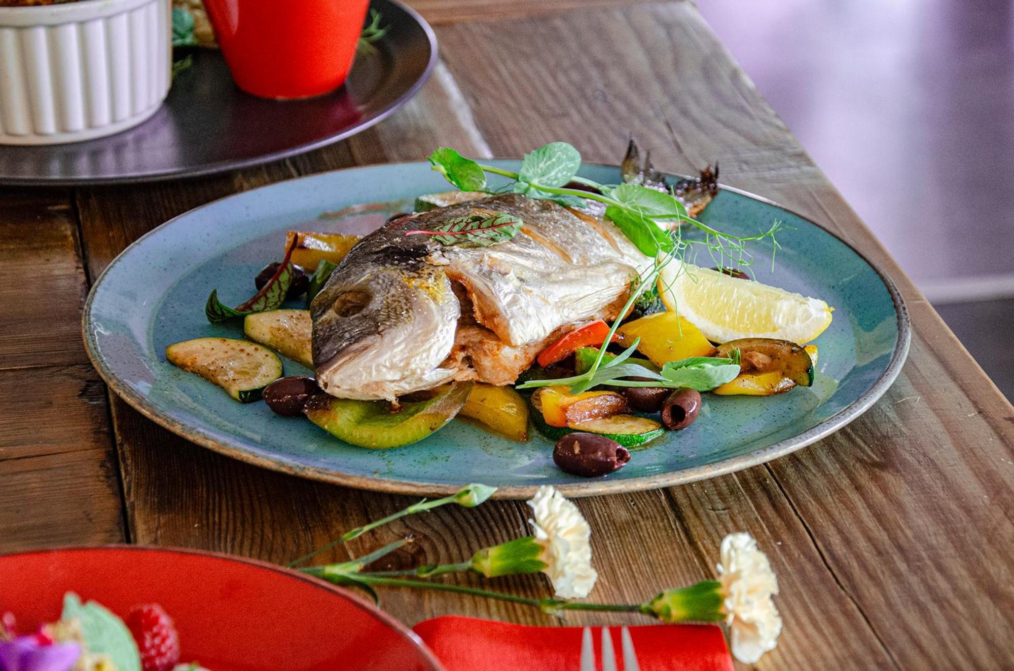 Willa Port Ostroda Bagian luar foto A plate of grilled fish